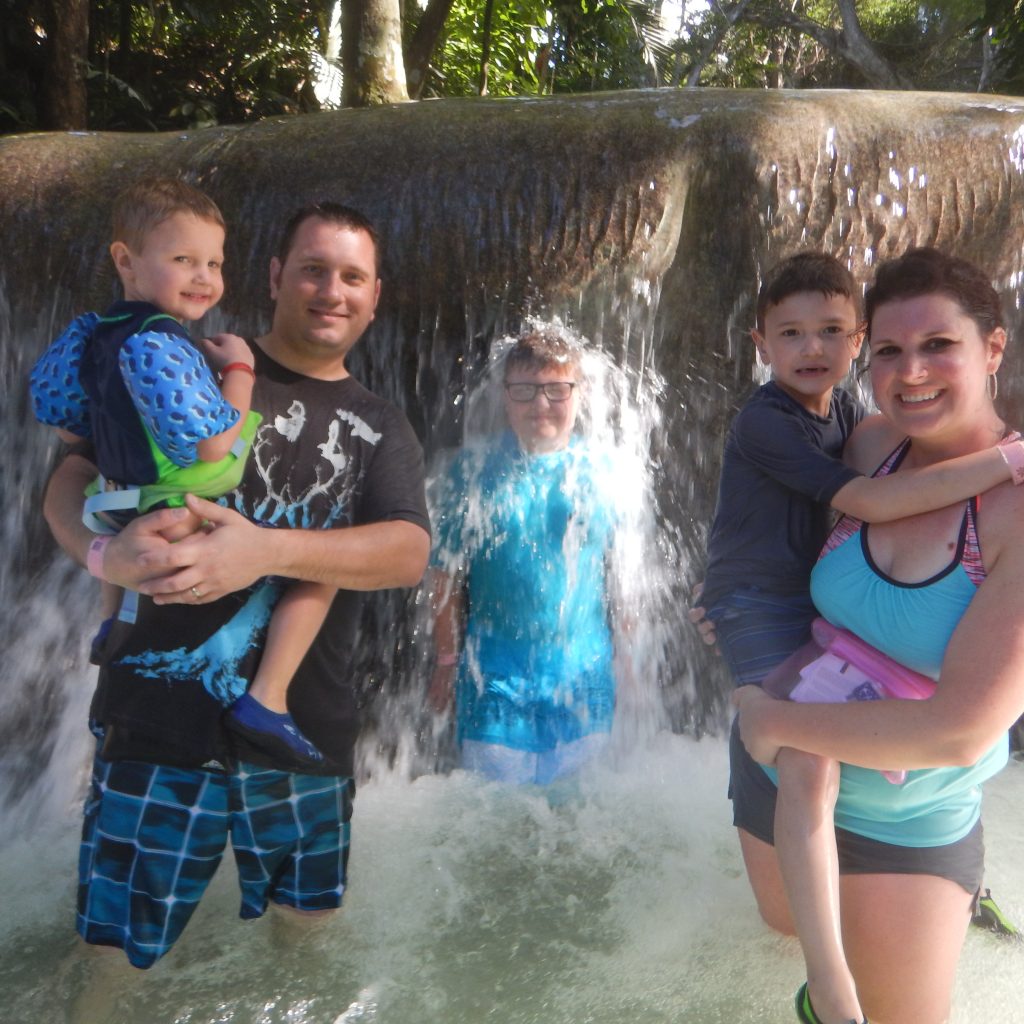 Our family climbing Dunn's River Falls in Jamaica