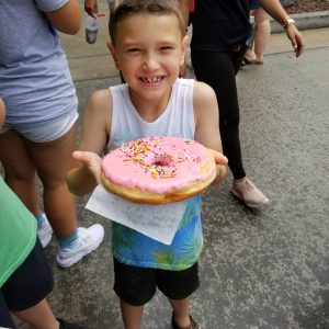 How to budget vacation food.  Donut from Ladlard donuts in Universal Orlando