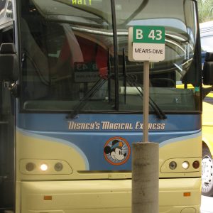 How to budget vacation transportation. Photo of Disney Magical Express bus