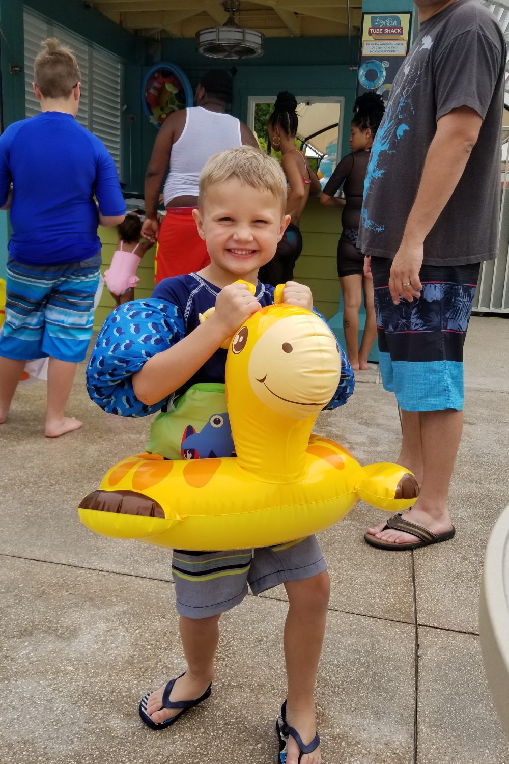 Child getting ready to go in the lazy river at Universal's Cabana Bay