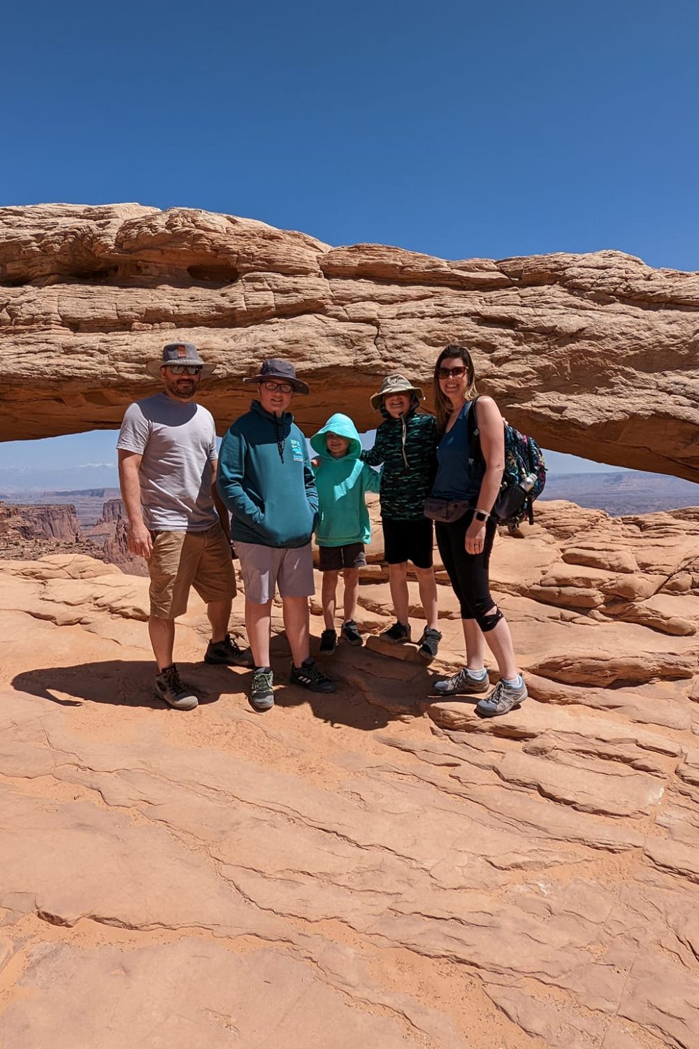 Our family in front of Mesa Arch