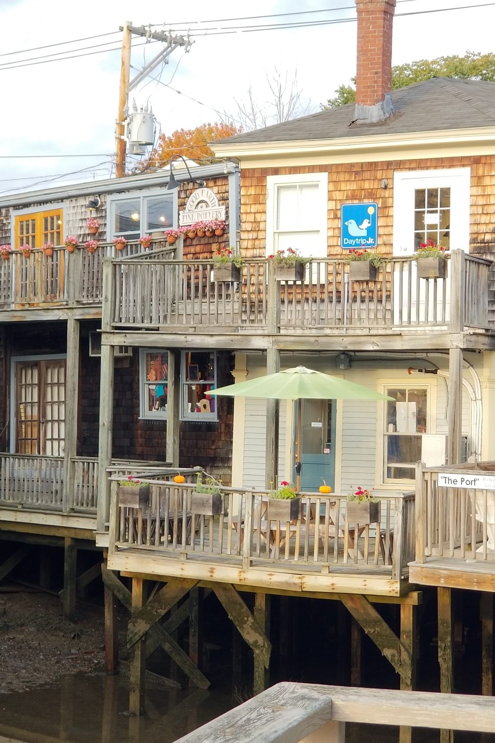 Shops built right over the water in the coastal town of Kennebunkport, ME