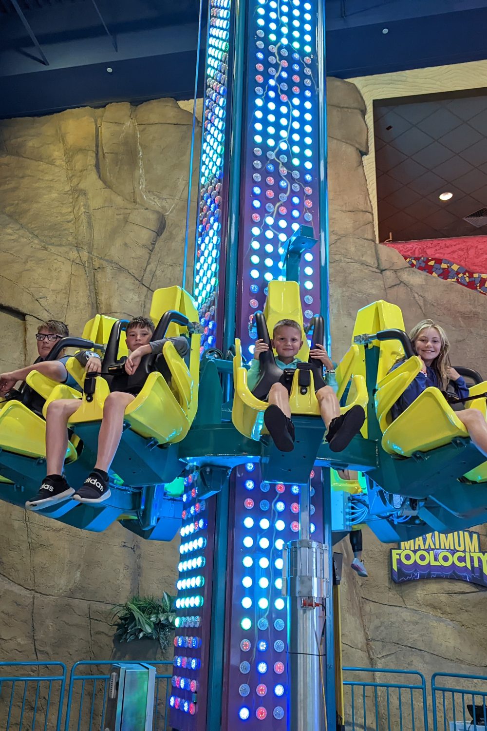 Our kids enjoying the rides at Tom Foolerys