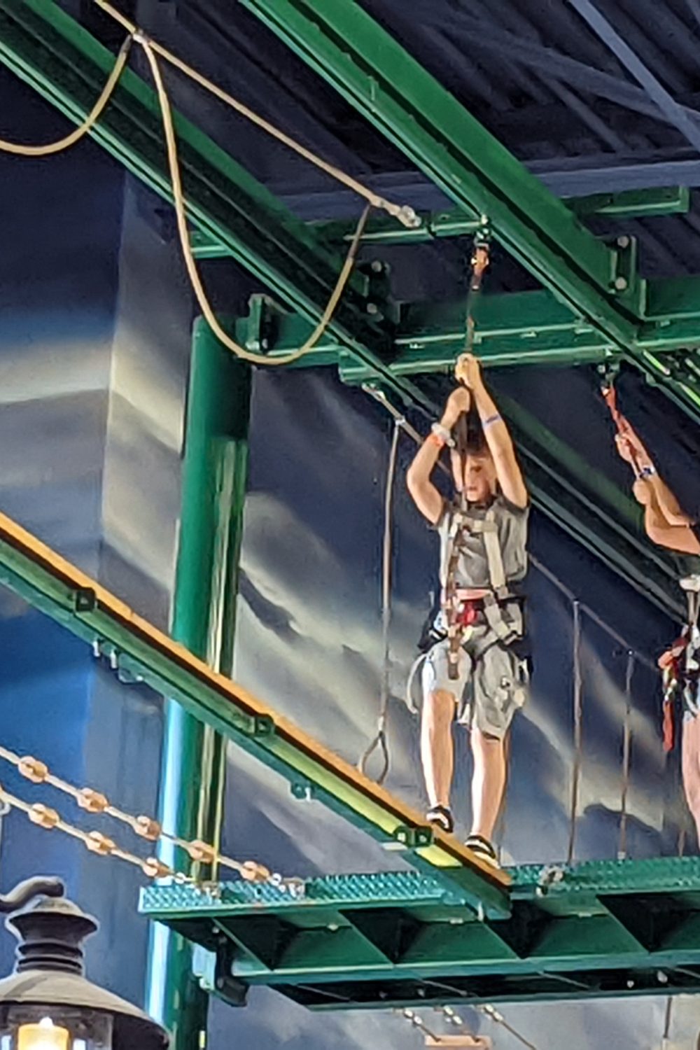 Our son doing the ropes course at Tom Foolerys