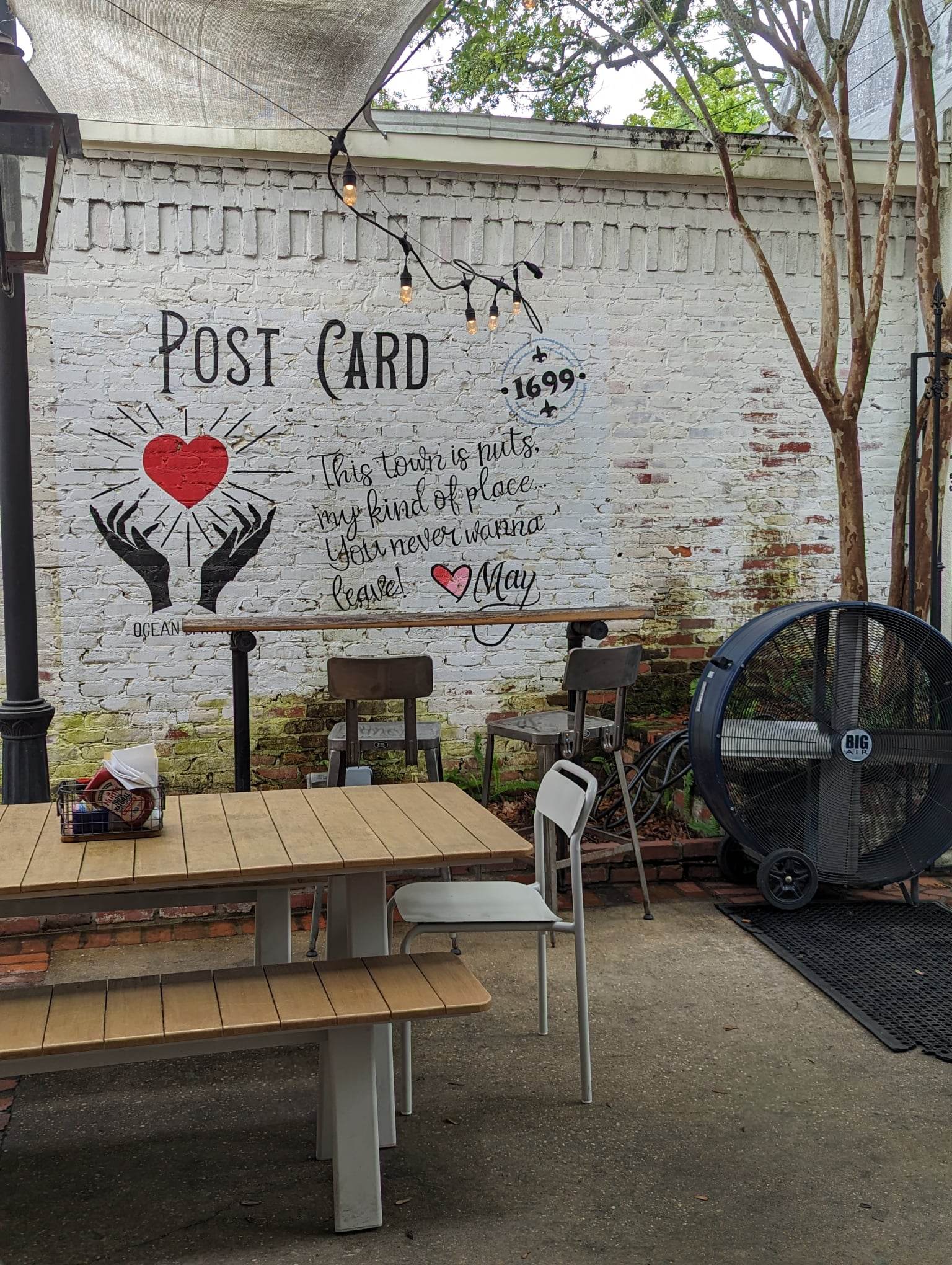 Cute post card wall at the Lady May in Downtown Ocean Springs