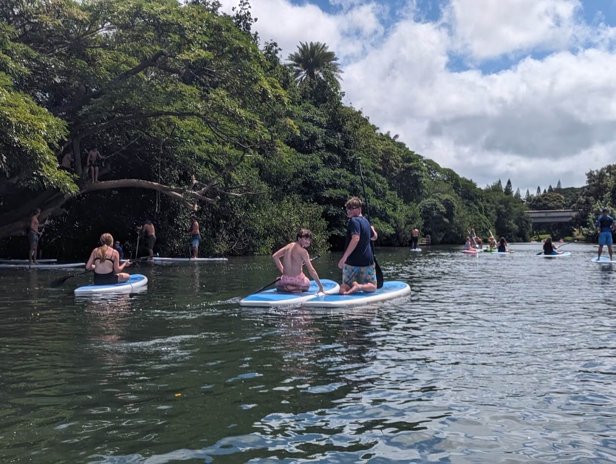 Our boys paddle boarding on the North Shore in Oahu