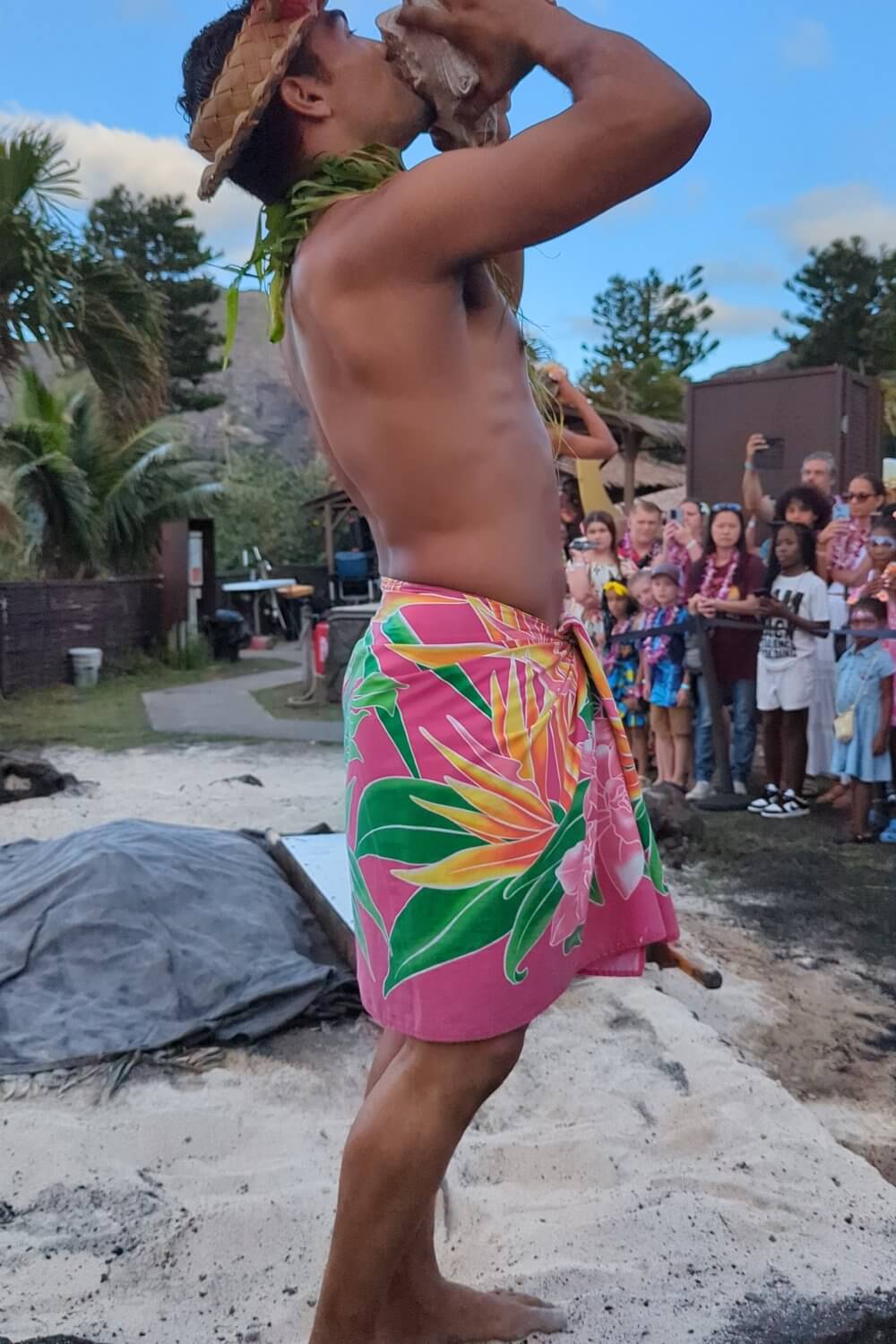 Conch blowing ceremony at the Aloha Kai Luau