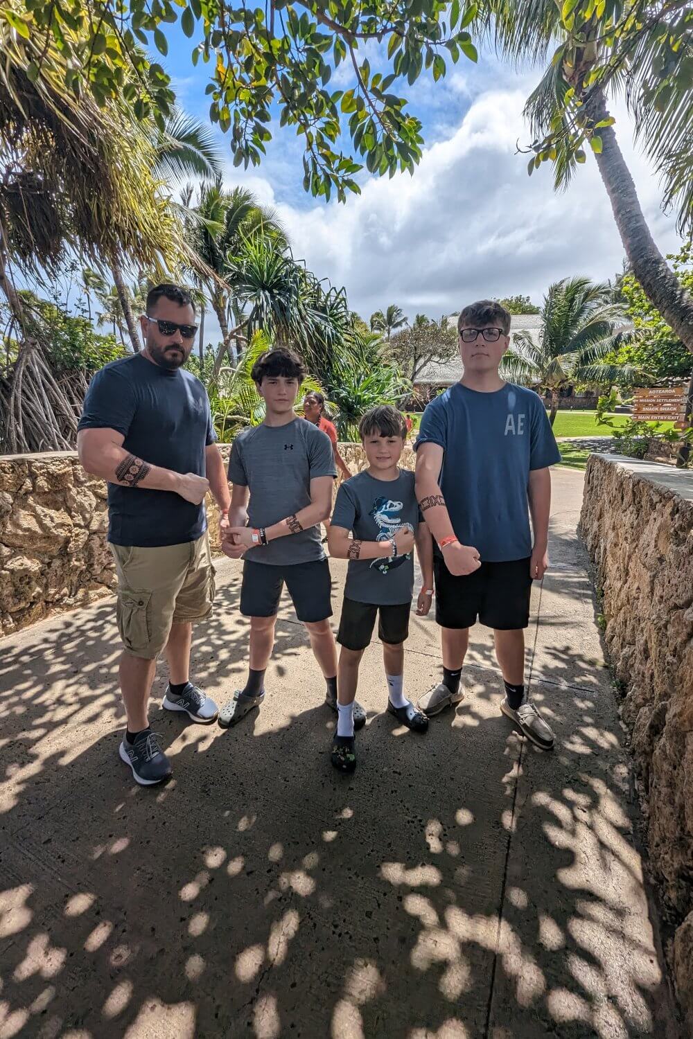 Boys getting cultural tatoos at the Polynesian Cultural Center.