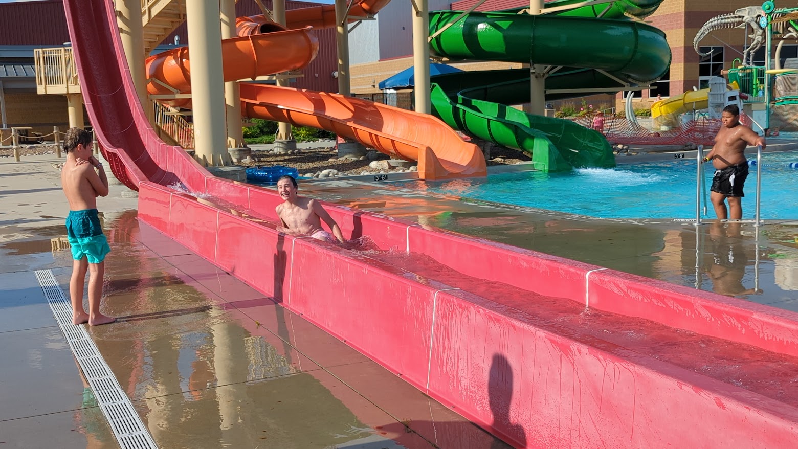 Cohen sliding down the waterslide at the West River Community Center