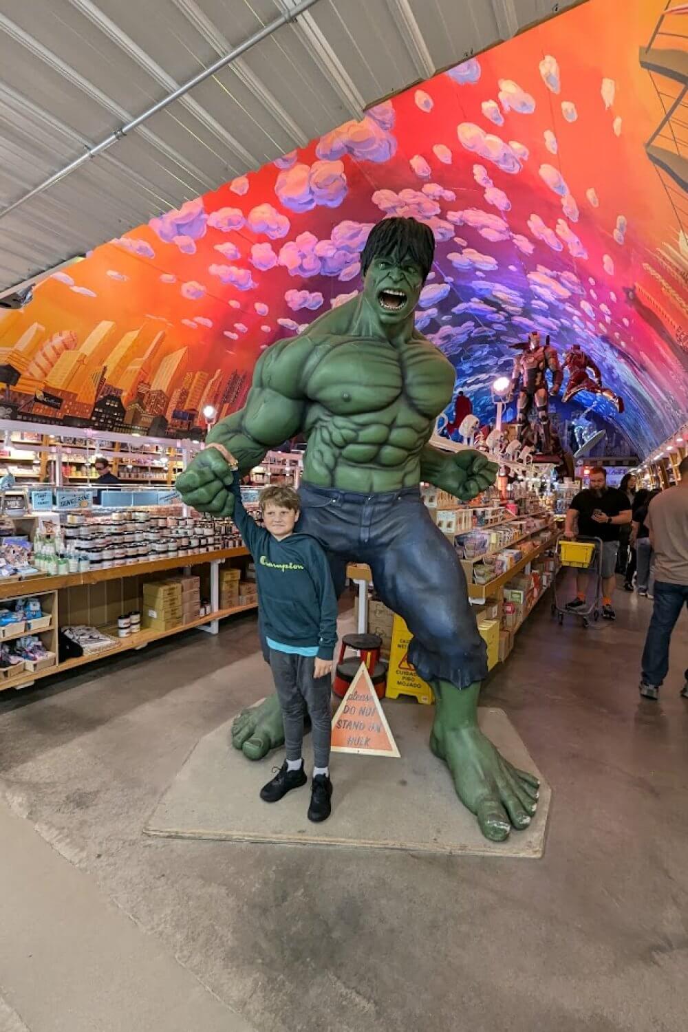 Tyler standing with Hulk in Minnesota's Largest Candy Store