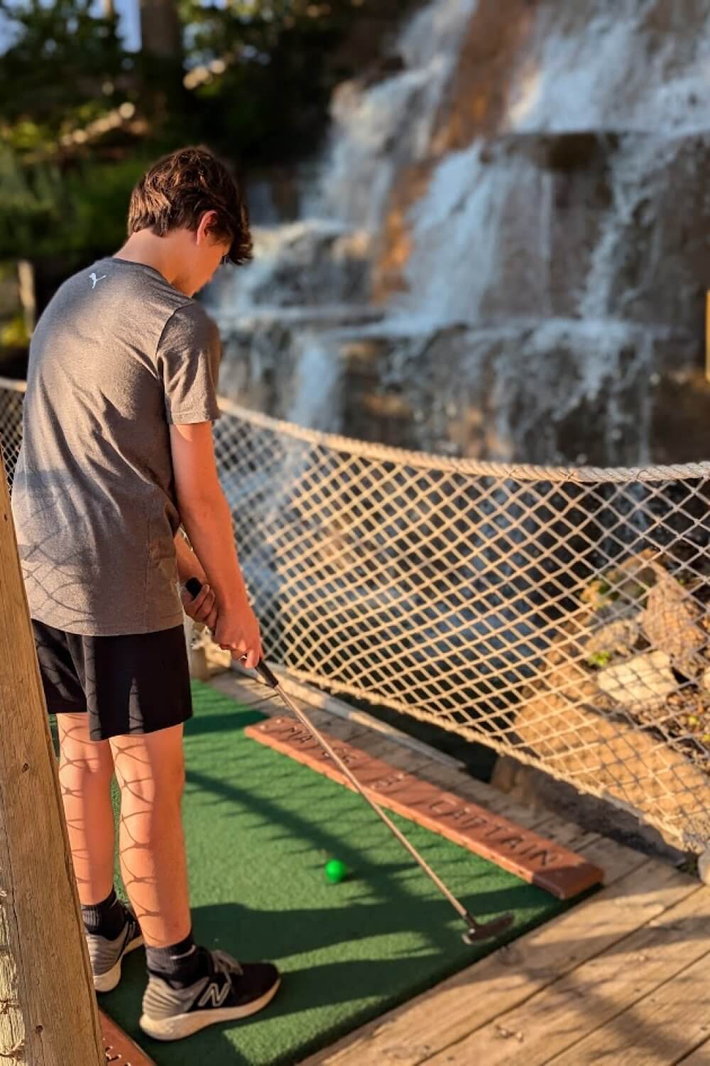 Cohen golfing at Pirate's Cove 