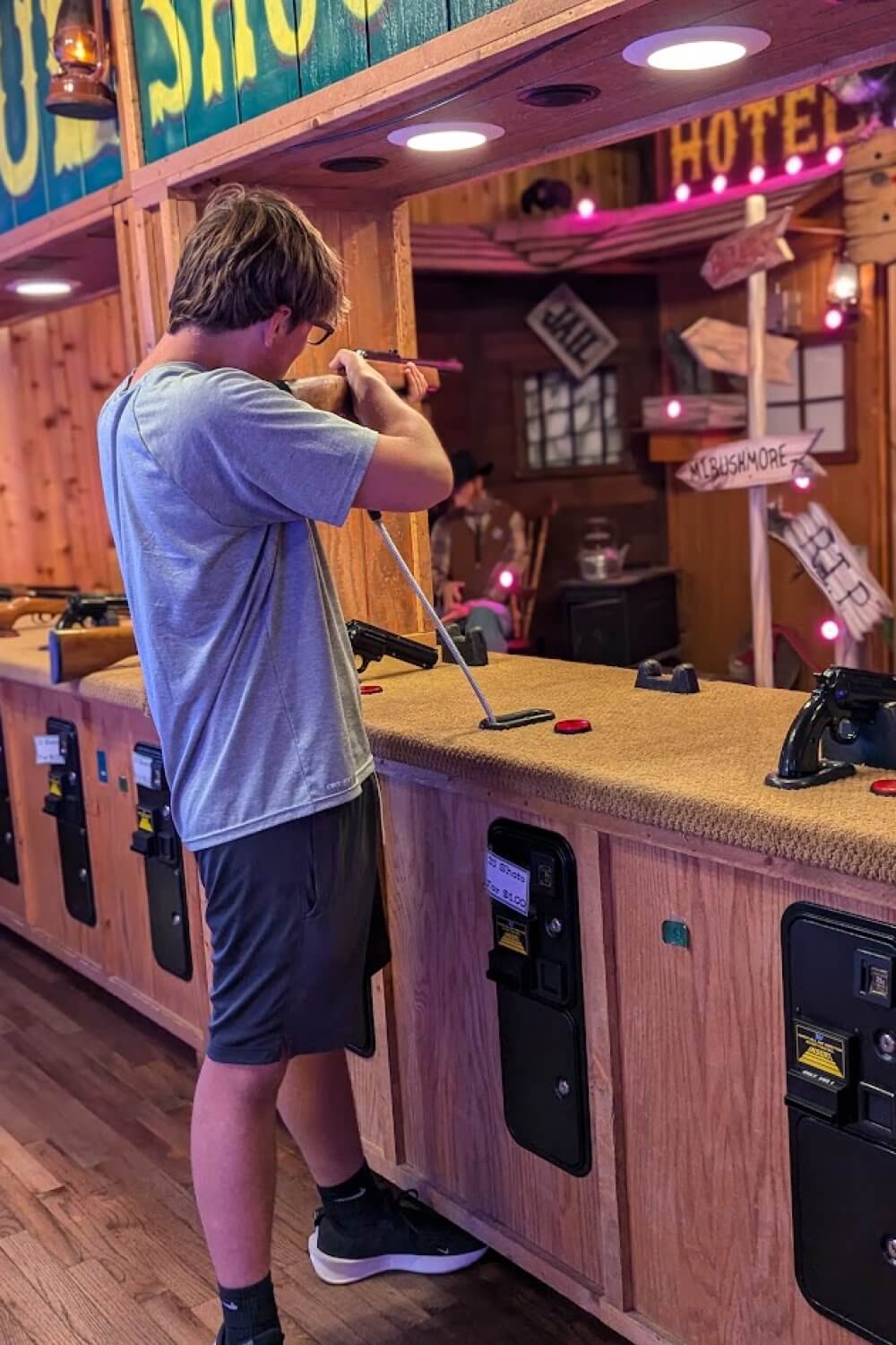 Mikey practicing a round of shooting at the range at Wall Drug