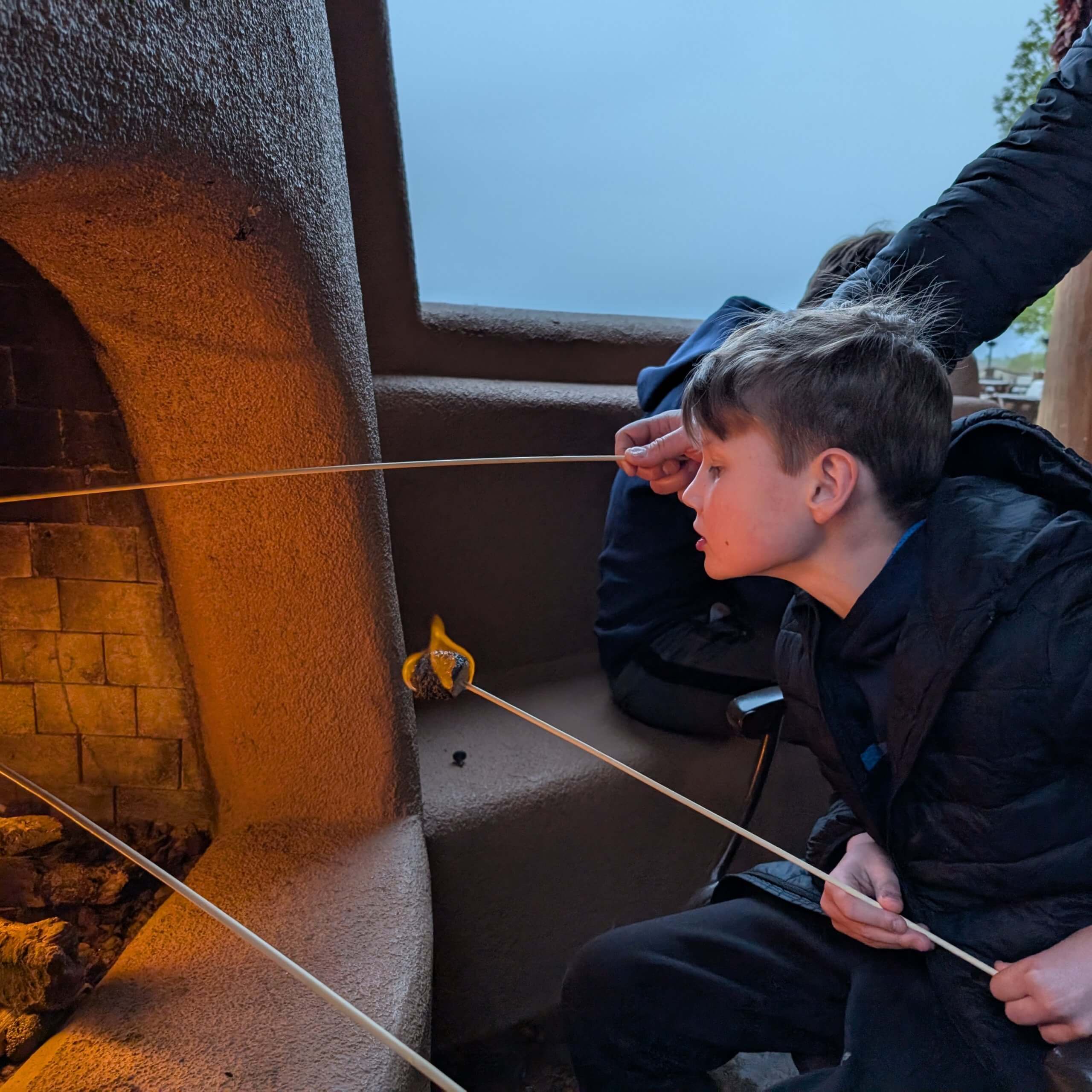 Roasting s'mores at Hyatt Regency Tamaya