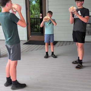 Our 3 boys blowin ginto conch shells at the Biscayne National Park Visitor Center