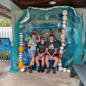 A photo of our three boys at Biscayne National Park