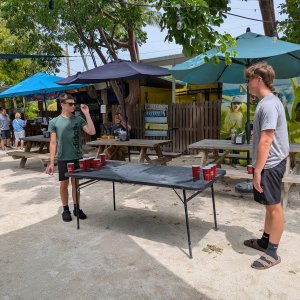 Our older kids playing beer pong (without the beer) at Islamorada Brewery