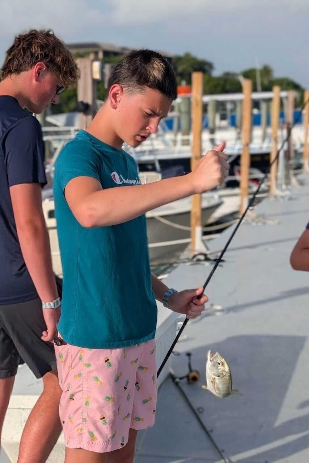 Cohen catching a fish at Baker's Cay Key Largo