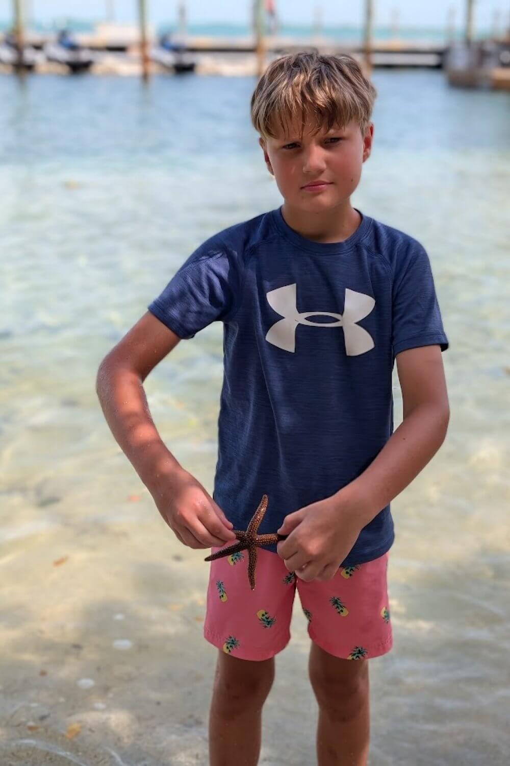 Tyler with a starfish he found