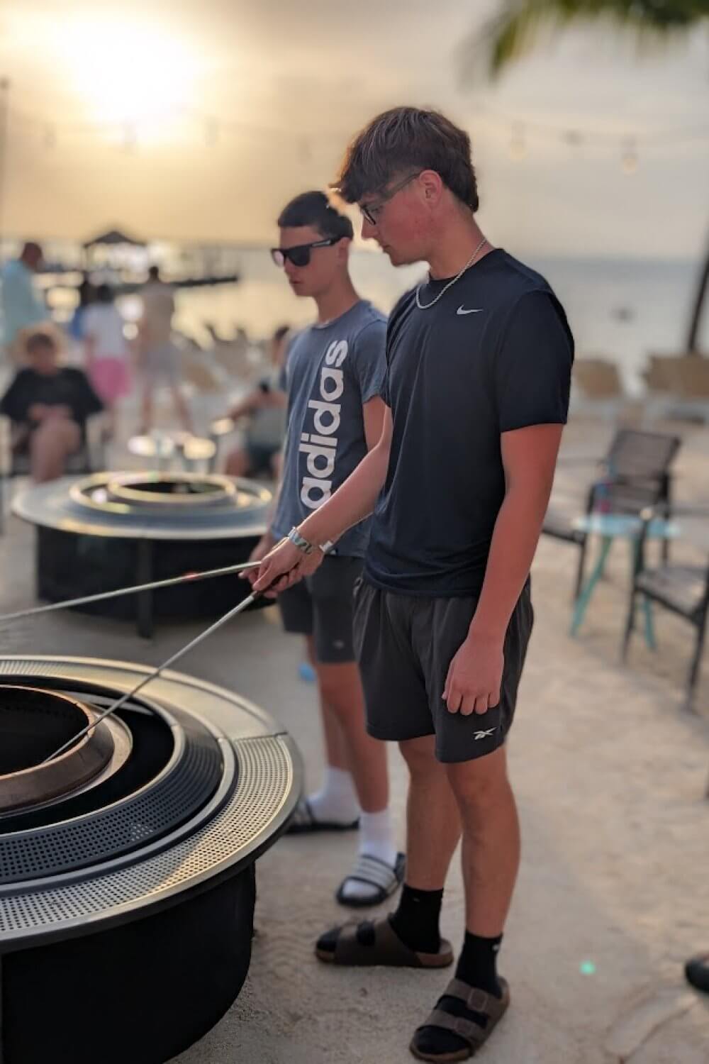 Our boys roasting marshmallows on the beach