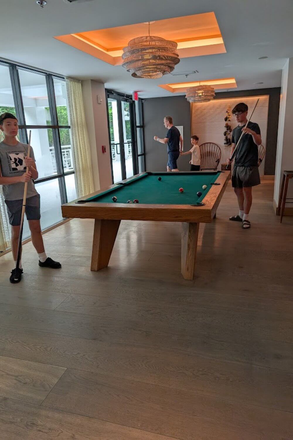 Our kids shooting pool