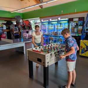 Kids playing in the arcade at the resort