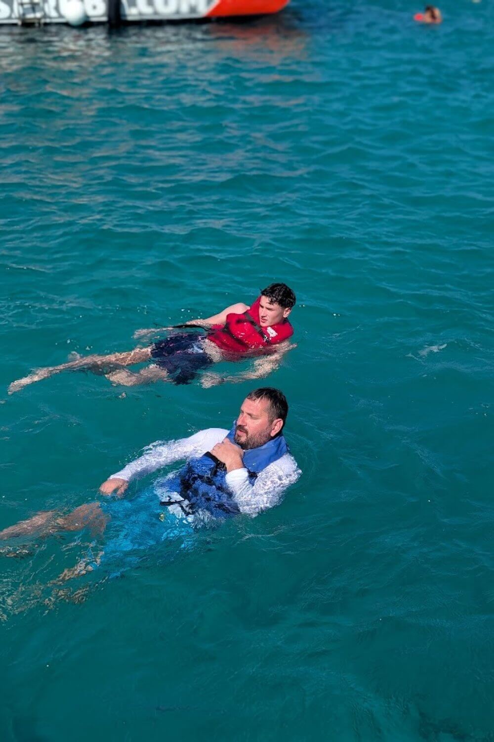 Mike and Cohen swimming during our snorkel tour