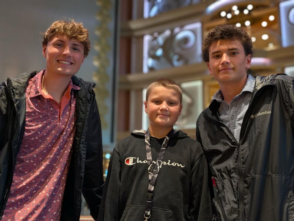 Boys posing for a photo on the cruise ship